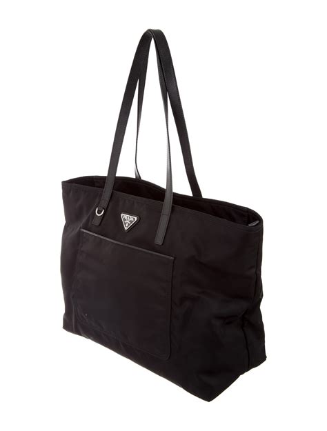 prada canvas-trimmed tessuto tote|prada beach tote.